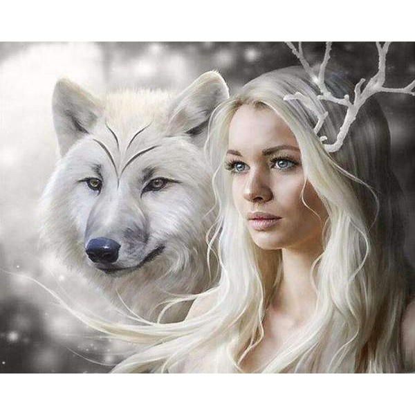 Loup blanc avec une jeune femme blonde