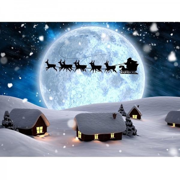 Traîneau de Noël devant la lune